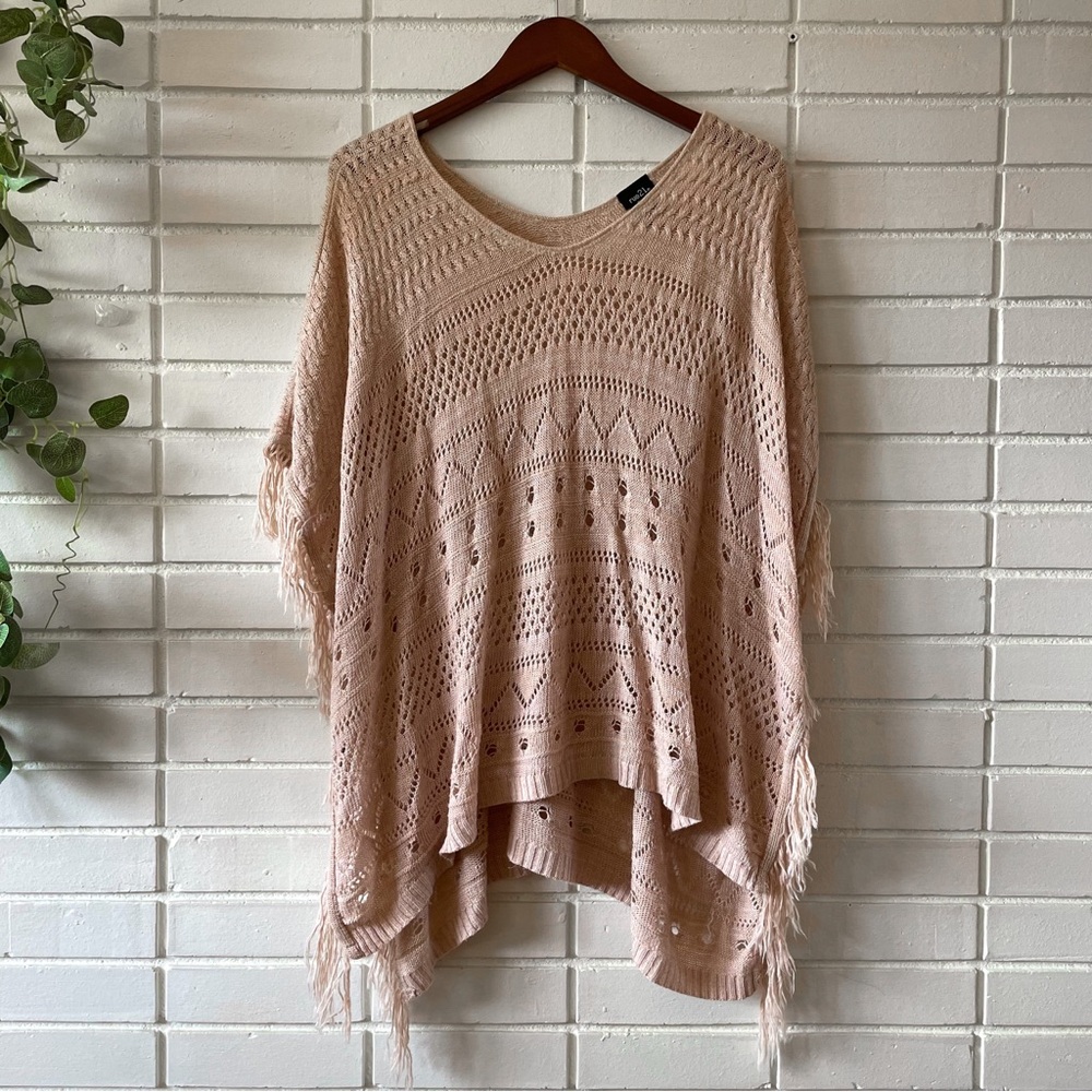 Boho Chic Knitted Poncho Sweater with Tassles